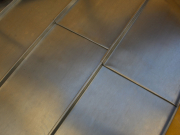 Photo Etanchéité d'une toiture mitoyenne à faible pente : réalisation d'une couverture Joint debout VMZINC