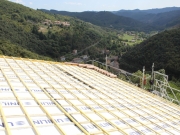 Photo Rénovation énergétique d’un bâtiment ancien en pierres avec l’aménagement de combles, sur la commune de Chirols en Ardèche