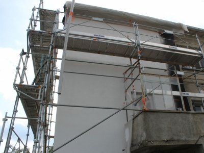 Travaux en cours, ITE, pose de la couche de finition.JPG